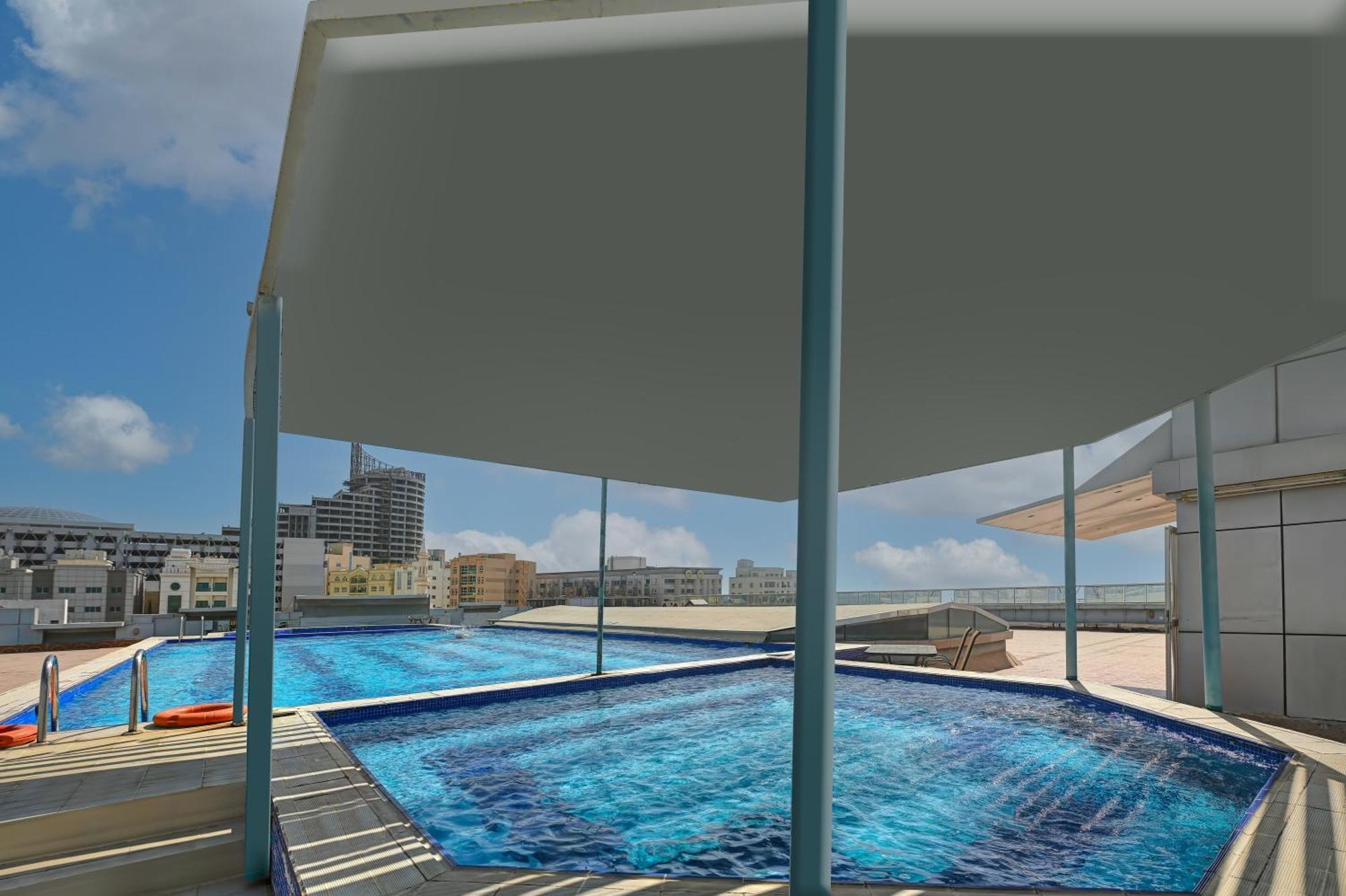 Al Bustan Hotel Sharjah Bagian luar foto