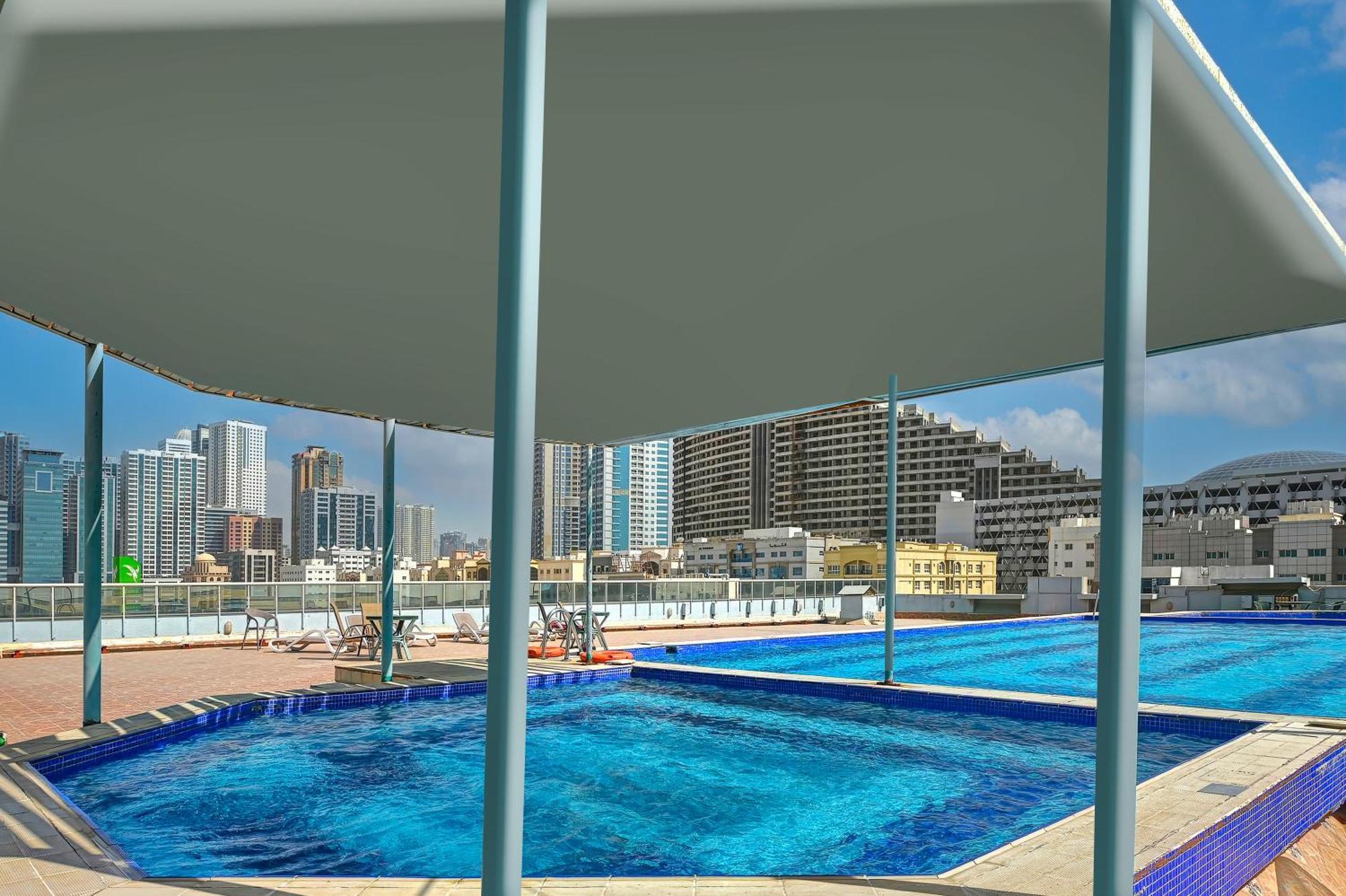 Al Bustan Hotel Sharjah Bagian luar foto