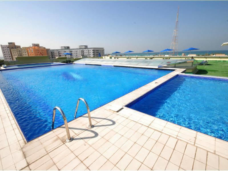 Al Bustan Hotel Sharjah Bagian luar foto